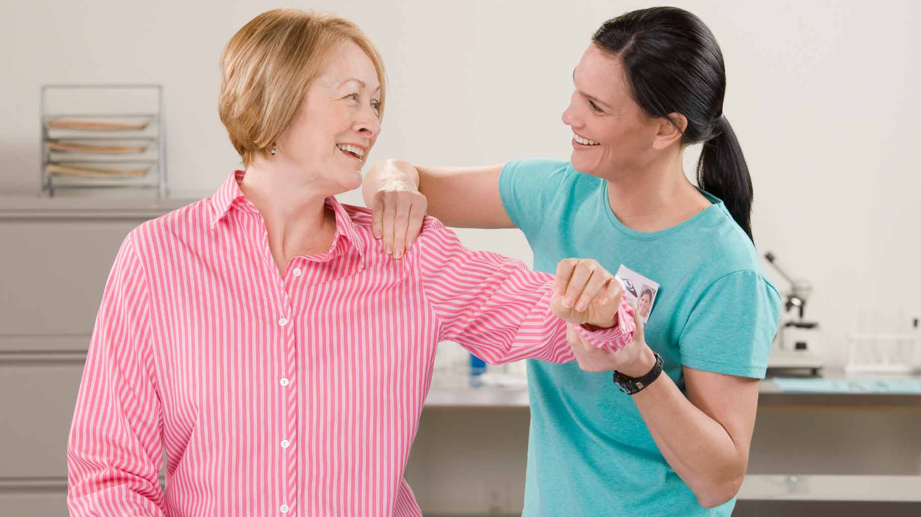 physical therapist woman with patient