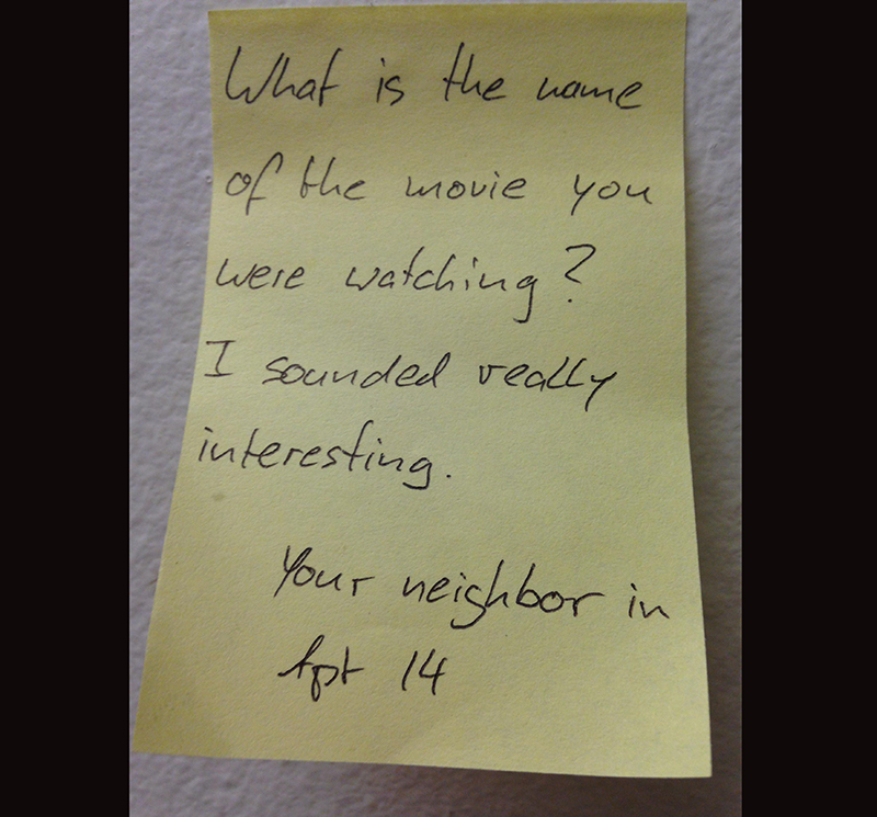 A passive aggresive note asks a neighbor what movie they were watching that sounded so interesting.