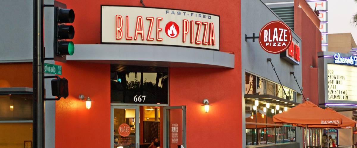 PASADENA/CALIFORNIA - FEB. 12, 2017: Building facade of the popular Blaze Pizza restaurant. Image was captured after sunset in Pasadena, California USA