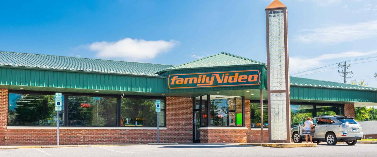 HICKORY, NC, USA-9/2/18: A Family Video store, one in the only chain of video stores in the U.S., with one car and one female in parking lot.