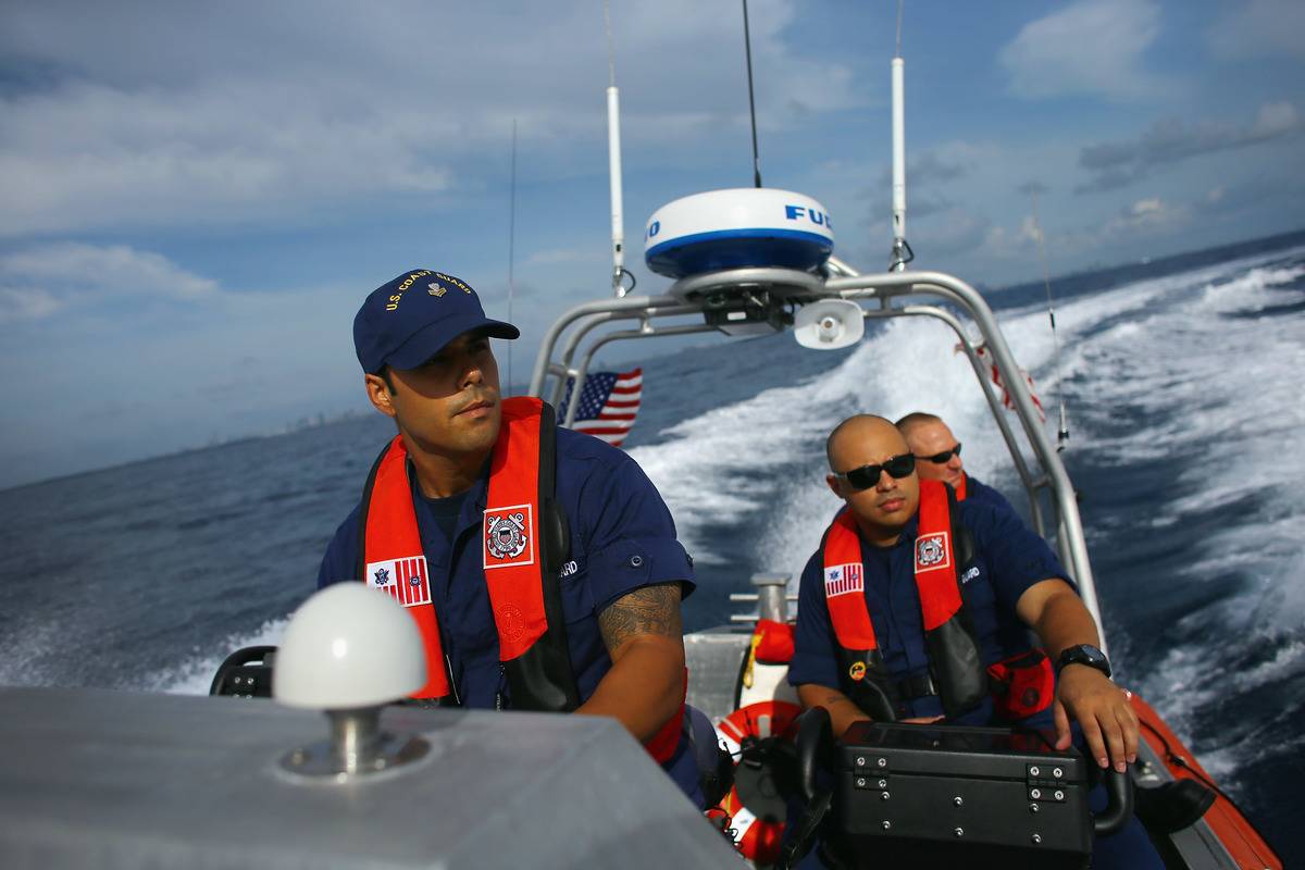 Members of the Miami Coast Guard sail across the ocean.