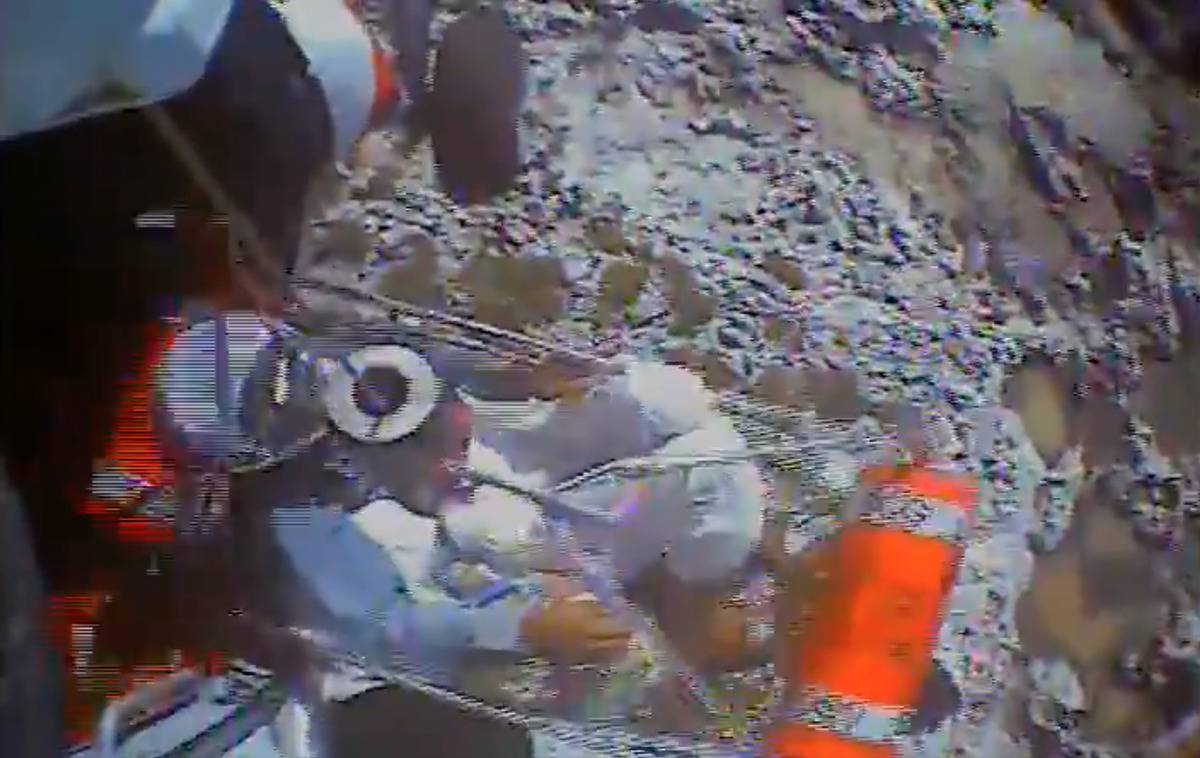 The Coast Guard lifts up survivors from Anguilla Cay.